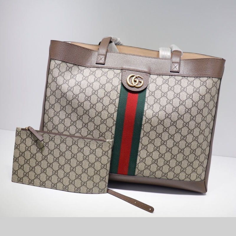 G*u*i shopping bags